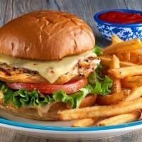 Grilled Chicken Sandwich · Juicy, seasoned grilled chicken breast topped with pepper jack cheese, fresh lettuce and tom...