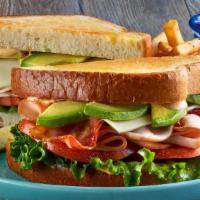 Turkey Club · Shaved turkey, swiss cheese, bacon, lettuce, tomatoes, sliced avocado, and chipotle mayo on ...