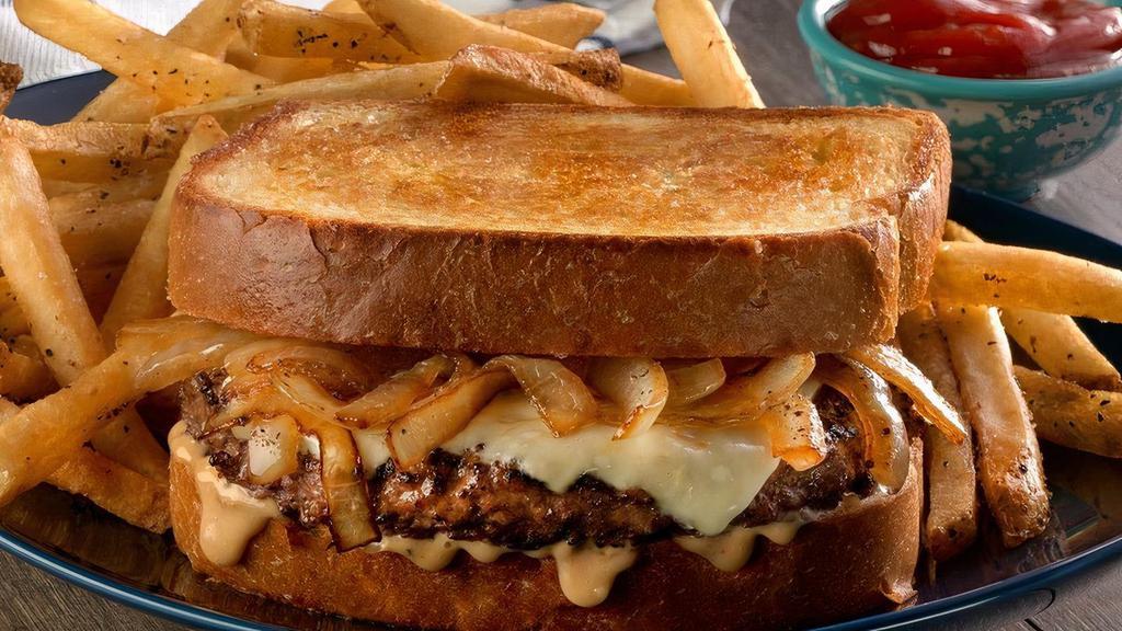 Patty Melt · 7 oz. angus beef patty covered in melted swiss cheese, caramelized onions, bacon-mayo and set between butter-grilled Texas toast