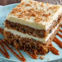 Carrot Cake · Sweet, lightly spiced cake with freshly-shredded carrots, sweet 'n juicy pineapple, flaky co...