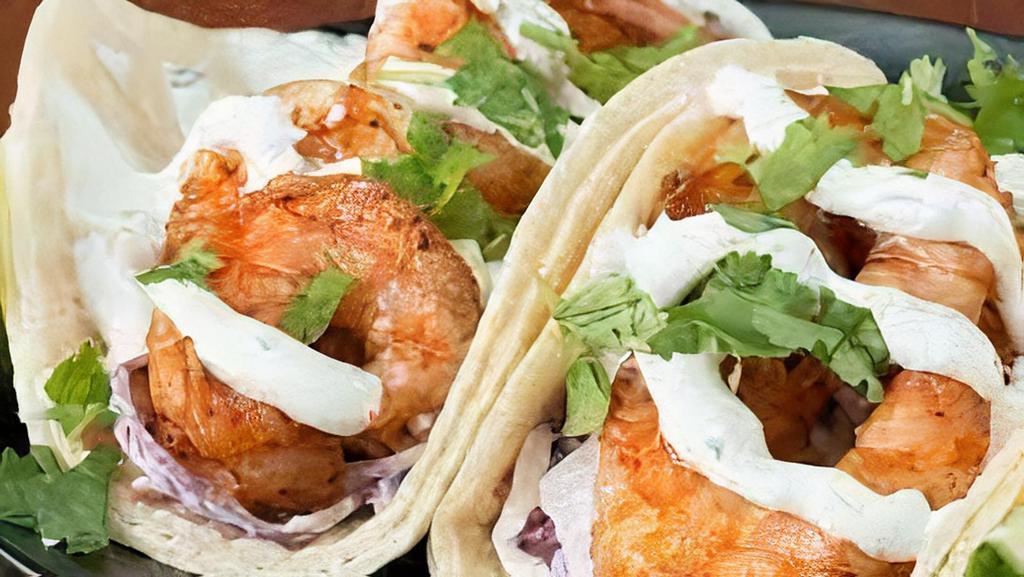 Tacos De Camaron · Gulf shrimp sauteed in chile-lime butter, fresh vegetables y coleslaw a la Mexicana with arroz y sliced avocado ensalada.