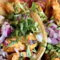 Shrimp Ceviche Tacos · Cool and tasty shrimp ceviche, shrimp cooked in lemon juice served with chopped red onion, c...