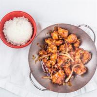 Orange Chicken · Crispy chicken tenderloins sauteed with Orange peels in spicy hunan sauce.