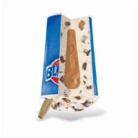 Royal Reese'S® Brownie Blizzard® Treat · Reese's® peanut butter cups and brownie pieces blended with creamy vanilla soft serve then f...