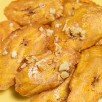 Tostones Con Ajo · Fried plantains with garlic.