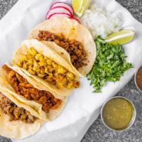 Chicken Taco · Tacos filled with grilled chicken.