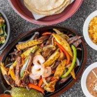 Fajitas  · Your choice of beef, chicken or combination. grilled with onions, cactus & bell peppers. Ser...