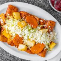 Enchilada Roja · Five enchiladas stuffed with queso fresco, cover with a spicy red sauce and topped with lett...