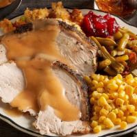 New! Roasted Turkey & Dressing · Sliced roasted turkey, perfectly paired with dressing, gravy and sweet and tangy cranberry s...