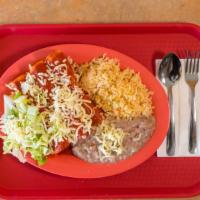 Enchilada Platter · Paired with a side of rice and beans. include rice beans and one flour tortilla.