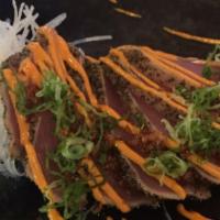 Pepper Tuna Tataki · Thin slices of seared ahi tuna with cracked pepper crust on the outside, served in spicy may...