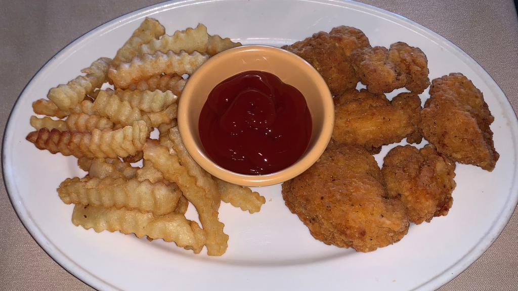 Kid'S Chicken Nuggets · Six Breaded Chicken Nuggets with a side of fries