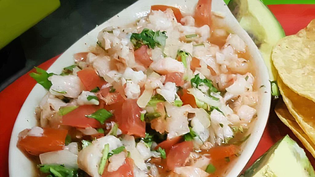 Fish Ceviche Plate · Swai fillet cooked in lime juice and soy sauce with pico de gallo, cilantro, avocado, and 3 tostadas.