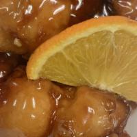 Cs10. Orange Chicken · White meat chicken fried crispy in our special orange sauce. Served with steamed rice, brown...