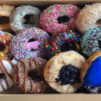 Hurts Dozen · Pre-selected box with 12 of our most popular donuts!
*May contain nut allergens