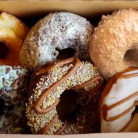 Hurts A Little · Pre-selected box with 6 of our most popular donuts! No substitutions allowed.
*May contain n...
