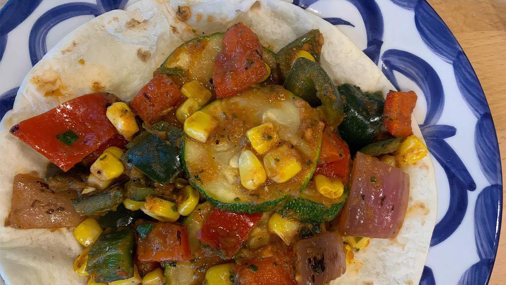 Ocho Maya · Veggie. Zucchini, corn, red onions, poblanos, red bell peppers,  flour tortilla.