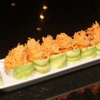 Fiesta Roll · Shrimp tempura, cream cheese, crabstick, topped with avocado, spicy crab, spicy mayo, eel sa...
