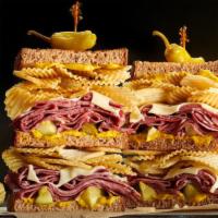 The Boss                  · This triple-decker giant is why delis were invented. Loads of tender, hot pastrami, Swiss ch...