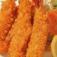 Shrimp Tempura (4) · Battered shrimp with tempura sauce.