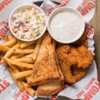 Adult Chicken Tender Basket · 4 fried chicken tenders, fries, house coleslaw, texas toast and white gravy.
