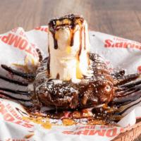 Deep Fried Brownie · Brownie battered in belgian waffle mix and deep-fried, topped with 2 scoops of vanilla ice c...