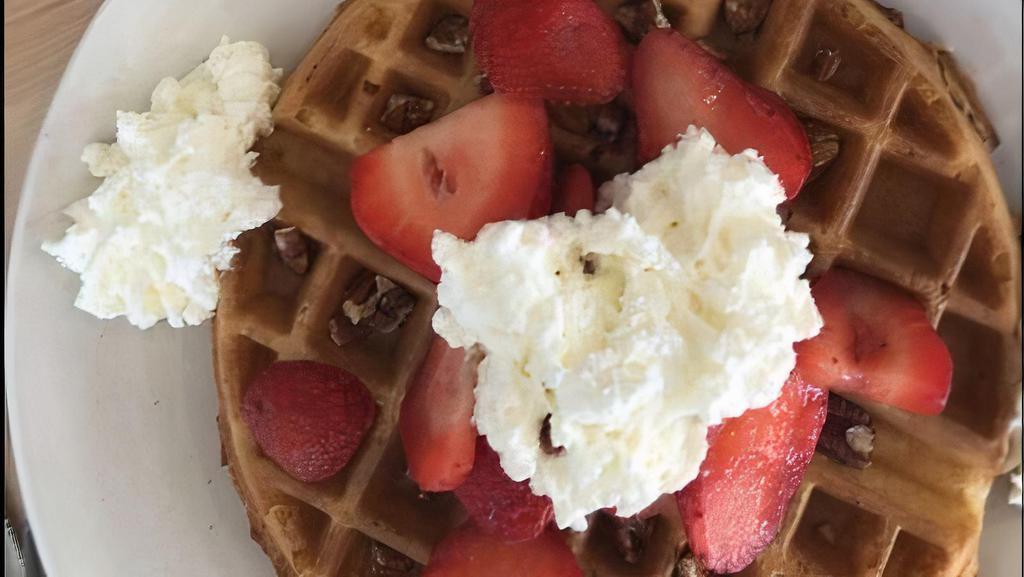 Strawberry Waffle · Fresh strawberries, whipped cream and powdered sugar.