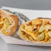 Chicken Shawarma Pita Wrap · Thinly sliced marinated chicken, French fries, pickles, and garlic aioli.