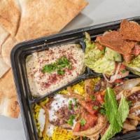 Veggie Plate · Vegan. Falafel, tabbouleh, hummus, Baba ghanouj, and pita.