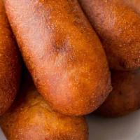 Corn Dog · Beef franks hand dipped in corn dog batter and fried till golden brown. Made to order, so it...