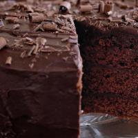 Chocolate Fudge Cake · Chocolate cake topped with chocolate cream cheese icing and crushed chocolate chips.