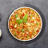 Thai Fried Rice To The Occasion · Thai-style stir-fried rice with egg, tomato, onion and scallions.