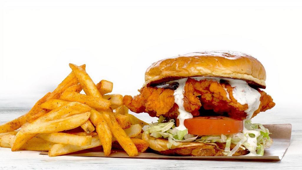 Spicy Buffalo Chicken Sandwich · fried chicken breast, buffalo sauce, lettuce, tomato, spicy ranch and a side of fries