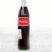 Mexican Coke · made with pure cane sugar