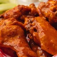 --10 Wings · Served with celery. Choice of ranch or blue cheese