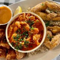 Cajun Platter · Breaded Gator nuggets, 2 pair frog legs and cup of crawfish jambalaya served over rice.