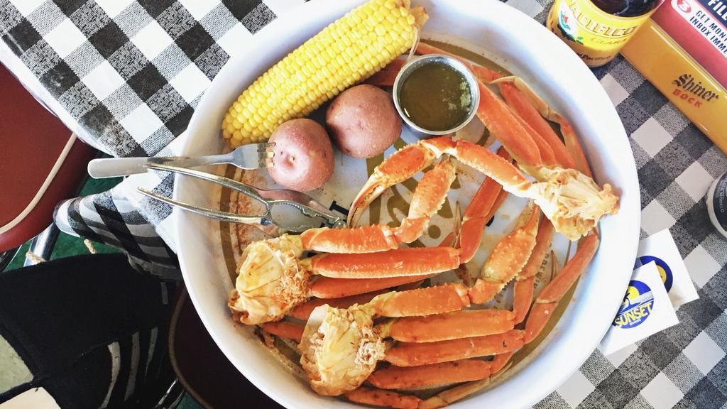 Snow Crab Legs · 1 lb snow crab legs with corn and new potatoes.
