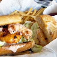 Bbq Shrimp Poor Boy · All Po Boy Loafs served on Cuban bread dressed with cocktail and tartar sauce and layered wi...