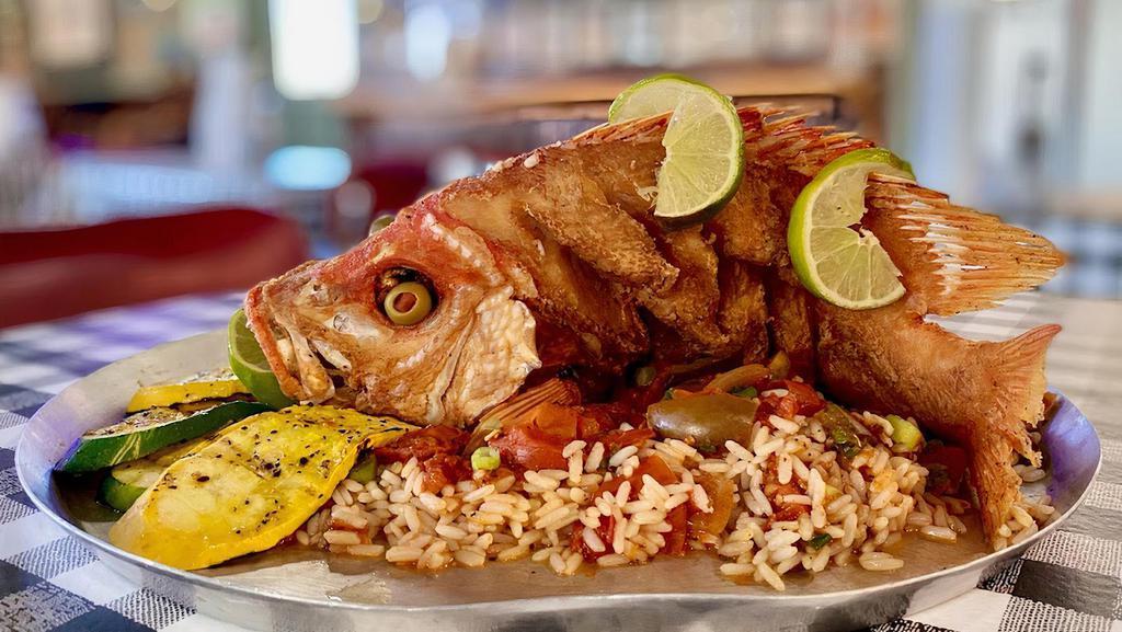 Fried Whole Red Snapper Veracruz · Served with rice and vegetables, topped with Veracruz sauce.