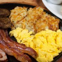 Hungry Man Breakfast · Bacon, sausage and ham, three large eggs, golden hash browns or grits. Toast