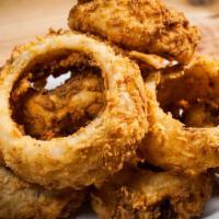 Onion Rings · Texas size onion rings. Served with ranch dressing.