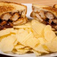 Bbq Chicken Strip Sandwich · Served on Texas toast topped with Swiss cheese and bbq sauce. Served with Ruffles potato chi...