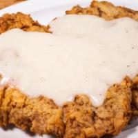 Chicken Fried Steak Strips · Strips of Our Famous Chicken Fried Steak, Battered and Fried Until Golden Brown. Served with...