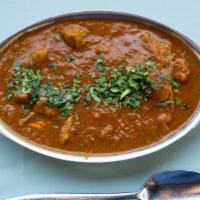 Lamb Curry · Lamb cubes cooked in a blend of curry spices.