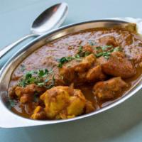 Chicken Curry · Boneless chicken cooked with exotic curry sauce.
