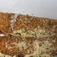 Mozzarella Sticks · A 6 count of mozzarella cheese sticks breaded and fried. Garnished with Italian herbs and se...