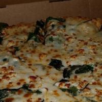 Caprina Pizza · Extra virgin olive oil, spinach, garlic, mozzarella and feta.