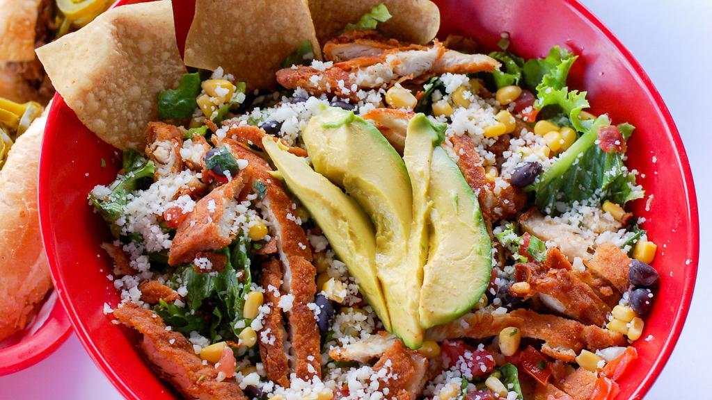 Boone Chickens Salad · Mix of romaine, green leaf and baby spinach. Chicken tenders, avocado, bacon crumbles, corn salsa, shredded mozzarella, croutons and olives. We suggest our Classic Ranch dressing!