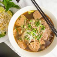 Pho-Licious (Best Seller!) · Rice noodles in a beef and chicken based broth soup. Comes with filet mignon thin slices, br...