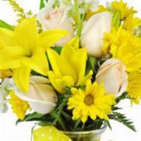 Smile A Mile Daisy Vase · Lemon yellow daisies and lilies with creamy roses and tender greens bring smiles from ear to...